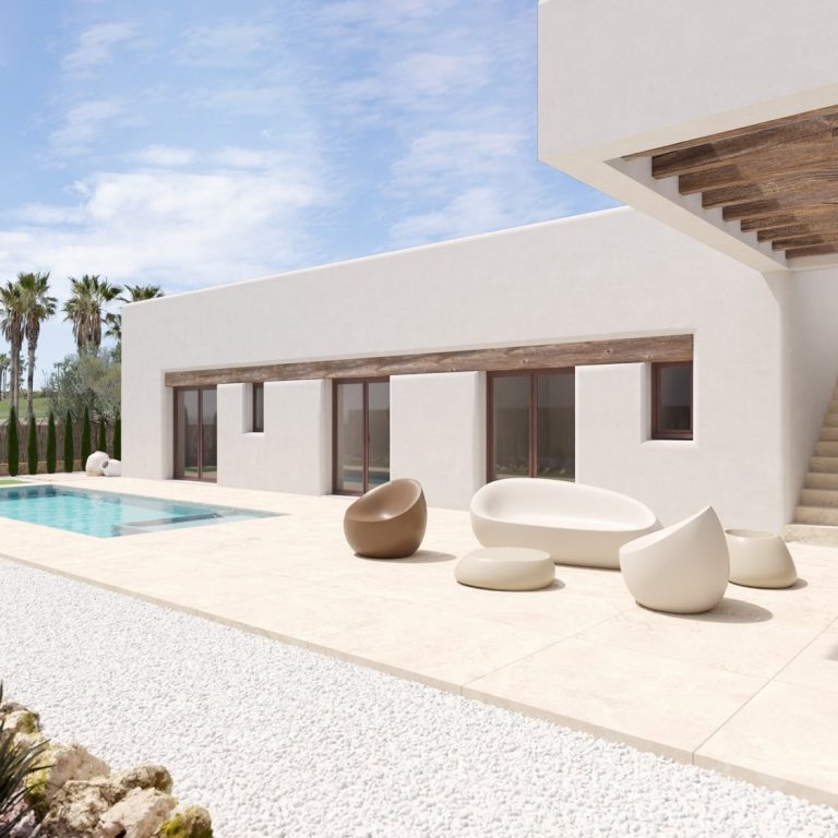 Lovivin estilo de arquitectura mediterranea Casa moderna con piscina y muebles de exterior en un entorno soleado.
